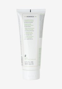 Witte tube met conditioner met groene tekst en afbeeldingen. Bevat productnaam, doel en meertalige etiketten. Formaat 200 mL.