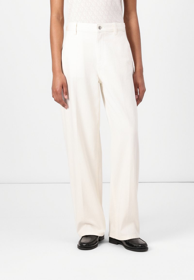 White wide-leg trousers made of cotton, featuring a front zip closure, belt loops, and a smooth, slightly textured finish.