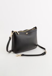 Carpisa Skuldertasker - black