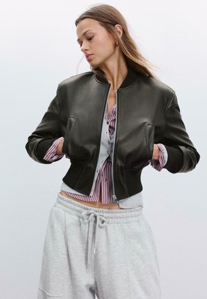 EFFECT WITH SHOULDER PADS - Bombertakki - black