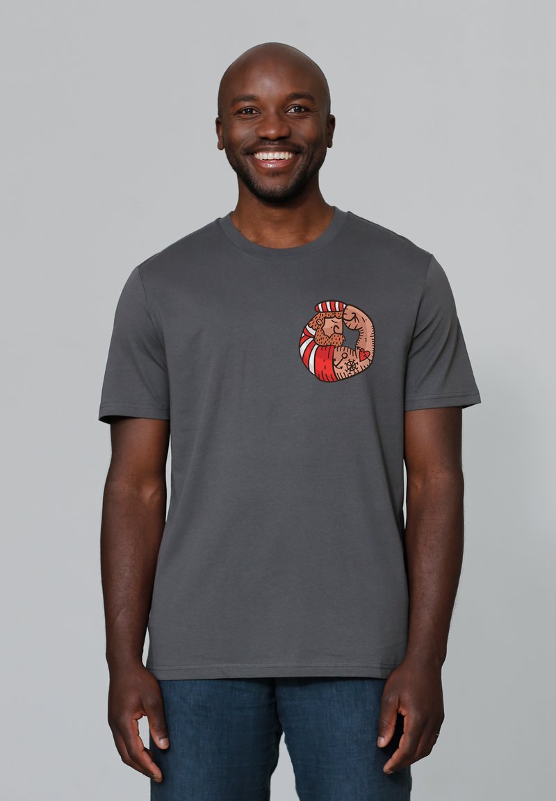 Grijze t-shirt met korte mouwen, voorzien van een kleurrafische cirkelafbeelding met gedetailleerde illustraties. Gemaakt van zachte stof, biedt een casual pasvorm.