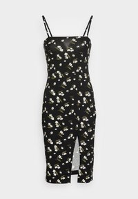 Musta midi-mekko valkoisella kukkakuviolla, ohuet olkahihnat, muotoiltu vyötärö ja etuläpivienti.