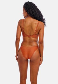 Bronze-colored bikini set featuring a textured fabric. The top has adjustable straps and a clasp closure; the bottoms are classic-cut.