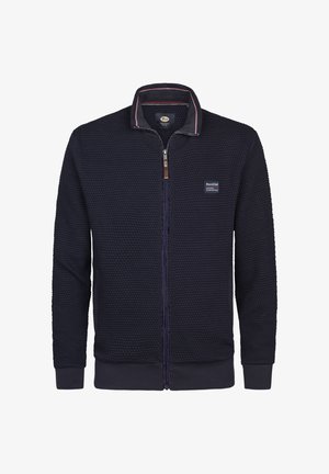 Námořnická bunda na zip s texturovaným vaflovým vzorem, kontrastním lemováním vnitřního límce, bočními kapsami a značkovou nášivkou na hrudi.