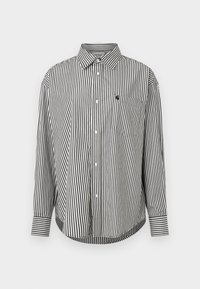 Schwarz-weißer, senkrecht gestreifter Langarmshirt mit spitzem Kragen, vorderer Knopfleiste und einer linken Brusttasche. Verfügt über kontrastierende Manschetten.