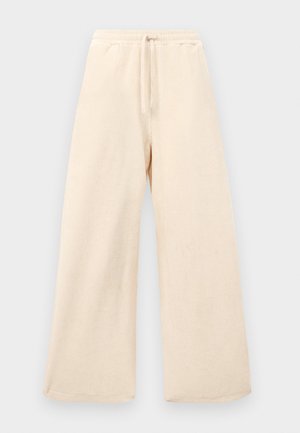Wijdvallende broek in een lichtbeige kleur, gemaakt van een textuurstof. Beschikt over een elastische tailleband met een trekkoord. Eenvoudig, ongecompliceerd ontwerp.