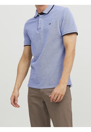 Polo shirt in light blue, featuring a textured design, black collar and sleeve accents, two-button placket, and a small logo on the chest.