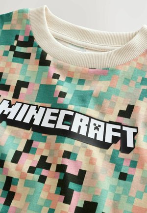 Mintgroene en pastelgekleurde sweatshirt met pixelpatroon en een geribbelde kraag, met een bold zwart "MINECRAFT" logo op de voorkant.