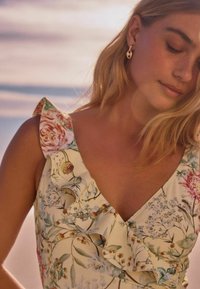Next FRILL WRAP TUMMY CONTROL - Uimapuku - yellow floral