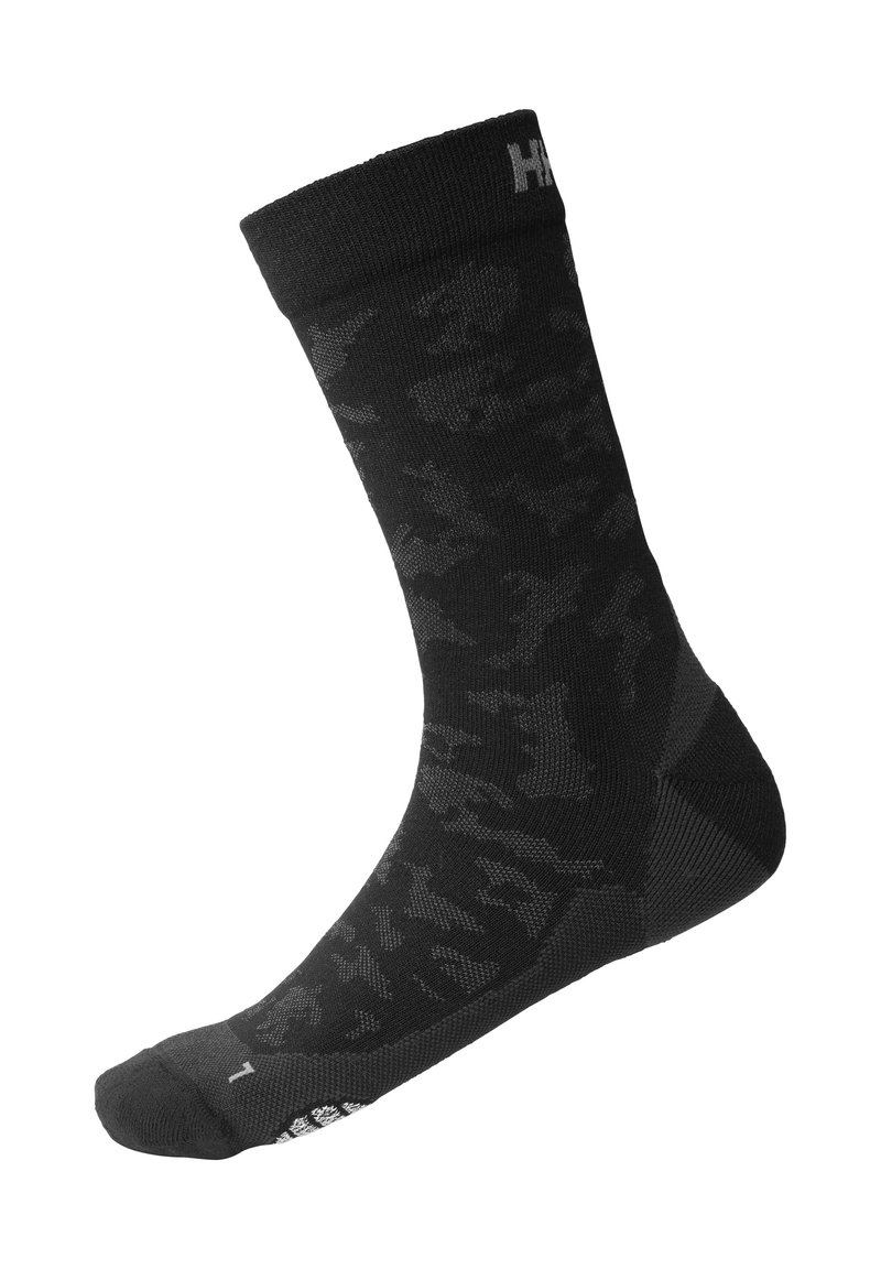 Calcetines negros con un sutil patrón de camuflaje, tejido de punto, talón y puntera reforzados, y un puño acanalado con detalle de logo en contraste.
