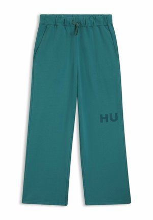 Turkusowe spodnie dresowe z elastycznym pasem, sznurkiem do regulacji, dwoma bocznymi kieszeniami oraz subtelnym logo "HU" nadrukowanym na lewej nodze. Gładka faktura.