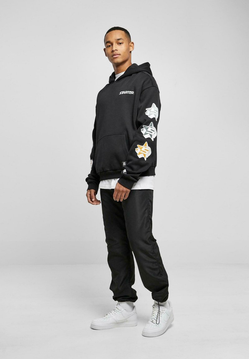 Felpa Con Cappuccio Uomo Starter Black Label: Oversize Con Maniche A Stelle, Nero - 2