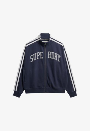 Navy blue zip-up jacket made of soft fabric, featuring white stripes on shoulders and "SUPERDRY" text across the chest in white embroidery.