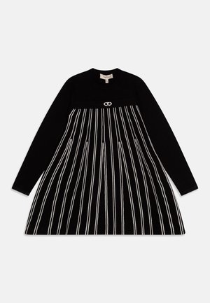 Black dress with long sleeves, featuring a fitted bodice and flared skirt. Vertical white stripes and a logo detail on the chest.
