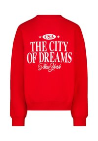 Felpa rossa con testo bianco sul retro che recita "USA La città dei sogni New York" in caratteri in grassetto e corsivo.