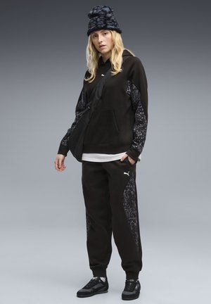 Puma, PUMA SPORT ANIMAL COMFORT PANTS FL - Pantaloni sportivi - black