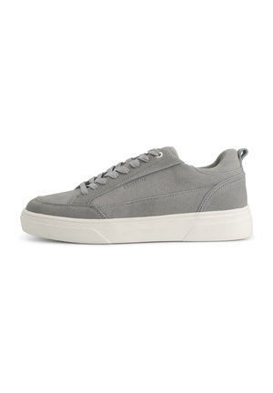 Gray suede sneaker with a textured surface, featuring a rounded toe, flat laces, and a white rubber sole. Minimalist design with no patterns.