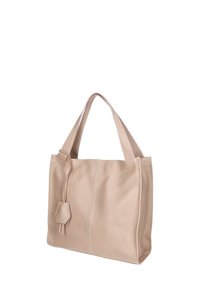 Beige leren shopper met twee korte hengsels, een gladde textuur, twee verticale naden en een klein decoratief kwastje bevestigd.