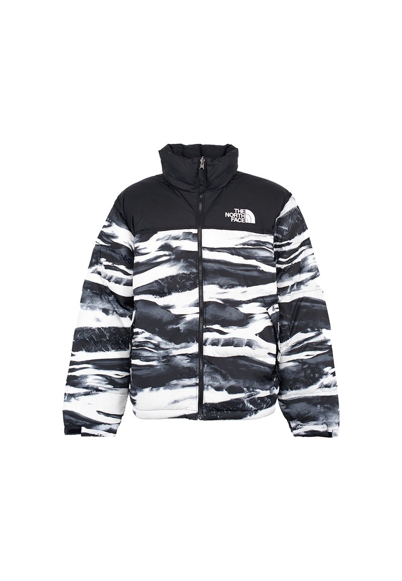 Giacca a vento con motivo astratto in bianco e nero. Presenta un colletto alto, zipper frontale e logo sul lato sinistro del petto. Texture trapuntata.