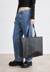 SCULPTED SLIM TOTE - Shopping bag - black