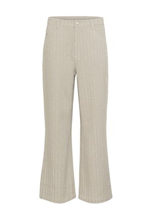 Beige flared pants with textured ribbed pattern, featuring a front button closure and pockets. Fabric appears soft with a slight sheen.