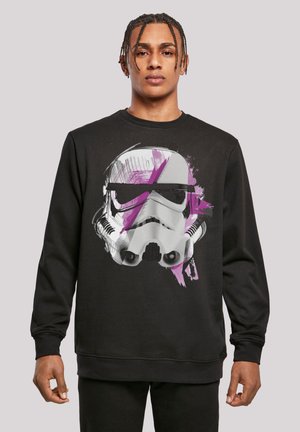 Schwarzes Sweatshirt mit einem stilisierten Stormtrooper-Helm-Design, akzentuiert mit lila Pinselstrichen. Das Material wirkt weich und hat einen Rundhalsausschnitt.