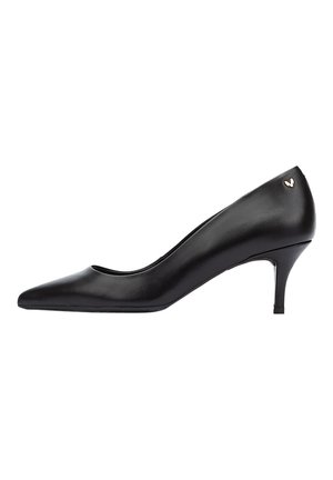 Black leather high-heeled shoe with a pointed toe and a small heel. Features a subtle logo accent on the heel. Smooth texture.
