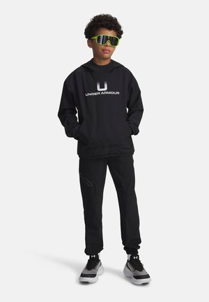 Under Armour UNSTOPPABLE WOVEN - Treniņtērpa apakšdaļas - black