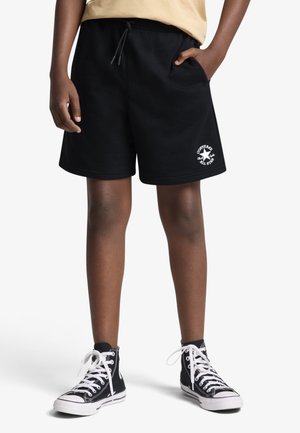 - Spodnie treningowe