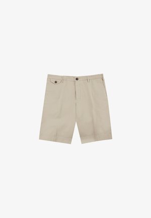 Beżowe bawełniane szorty z dwiema przednimi kieszeniami i detalem w postaci guzika. Posiadają płaski przód i prosty krój, co nadaje im casualowy charakter.