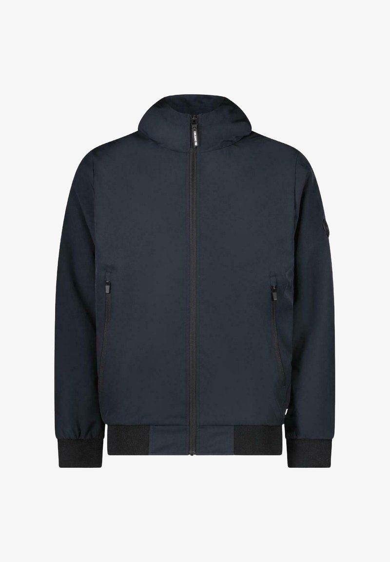 Marinblå huvjacka tillverkad av mjukt material, med full dragkedja, två sidofickor, ribbade muddar och en minimalistisk design utan synliga mönster.