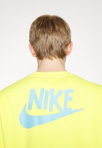 Nike Sportswear Sweatshirt - yellow