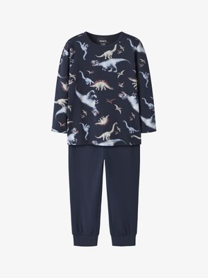 Temno modra pižama z dolgimi rokavi s potiskom dinozavrov in ujemajočimi hlačami z elastičnimi manšetami. Iz mehke, raztegljive tkanine.