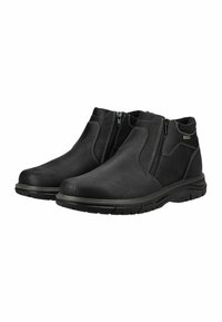 Schwarze Knöchelstiefel aus glattem Leder mit Reißverschluss und kontrastierenden Nähten. Die Sohle ist strukturiert und langlebig.