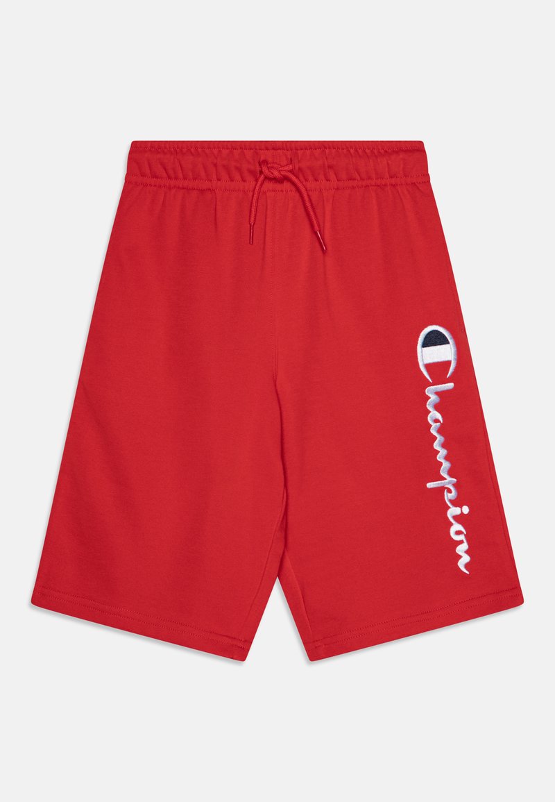 Shorts de sport rouges avec une taille élastique et un cordon de serrage. Présente le logo "Champion" brodé en blanc sur le côté. Matière en coton douce.