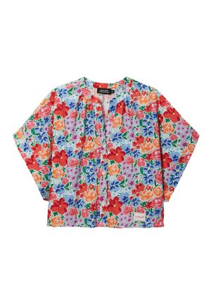 Chemise pour femme à manches courtes avec des boutons, arborant un motif floral coloré en rouge, orange, bleu et vert sur un fond clair.
