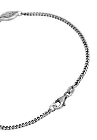 Silver chain bracelet featuring a woven design, lobster clasp closure, and a shiny, smooth metal finish. Measures approximately 8 inches long.