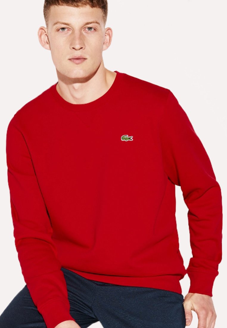 sweat lacoste rouge