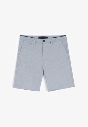 Jasnoniebieskie szorty z teksturowanej tkaniny, z dwiema przednimi kieszeniami, zapięciem na guzik oraz metką w pasie oznaczoną jako 'diverse'.