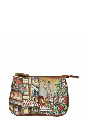 Printed fabric wallet featuring a Parisian street scene, with colorful flowers, a lantern, and the Eiffel Tower, bordered by brown leather trim.