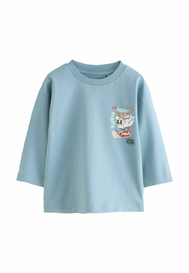 Lichtblauw katoenen t-shirt met een ronde hals, losse pasvorm en korte mouwen. Heeft een bedrukt ontwerp van een figuur en tekst aan de voorkant.