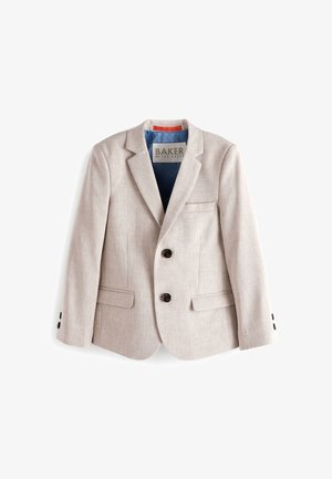 Beżowa marynarka z teksturowanej tkaniny, z dwoma ciemnymi guzikami, kieszenią i niebieską podszewką w wzory. Zaprojektowana z klapami o ostrych brzegach.