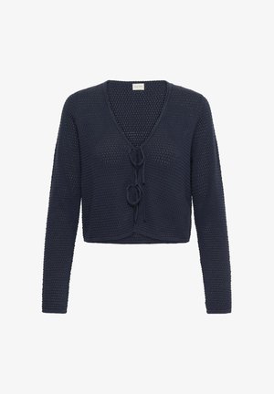 Cardigan court bleu marine à manches longues en maille ajourée, avec un col en V et deux nœuds à l'avant.