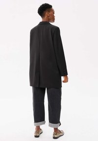 blue shadow ALMERIA - Halflange jas - black