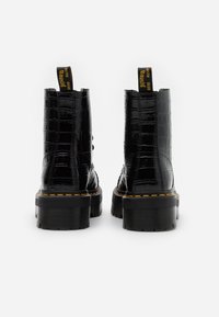 Dr. Martens SINCLAIR - Botas de tornozelo com plataforma - black
