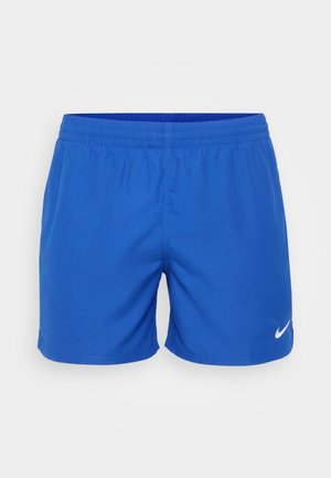 Modré sportovní šortky vyrobené z hladkého materiálu, s elastickým pasem a malým bílým logem Nike na dolní levé straně.