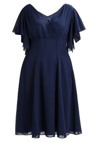 Vestido azul marino con escote en V, mangas flotantes y falda fluida. Hecho de tejido ligero, cuenta con un corsé ajustado y un suave caído.