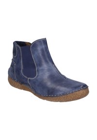 Bottine en cuir bleu avec panneaux élastiques sur les côtés, coutures contrastées et semelle en liège texturée. Fini lisse avec un design à bout rond.
