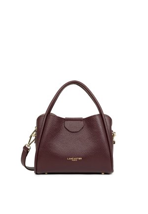 Sac à main en cuir texturé marron foncé avec deux poignées, ferrures dorées et logo Lancaster Paris au centre devant.