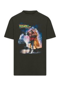 Black t-shirt featuring a colorful graphic of characters from "Back to the Future II" against a vibrant, lightning-themed background.